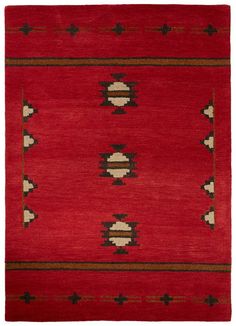 a red rug with black and brown designs on it, in the shape of an arrow