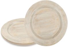 two wooden plates sitting on top of each other