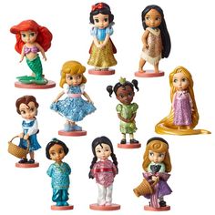 disney princess figurines are shown in different styles and sizes, including the little mermaid