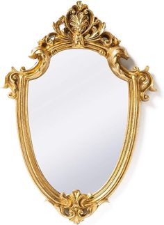 an ornate gold framed mirror against a white wall