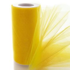 a roll of yellow tulle on a white background