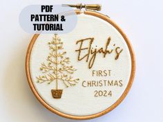 embroidered christmas ornament with the name and image of a tree in gold on it