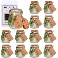 twelve small glass jars filled with cookies next to each other and tied with twine