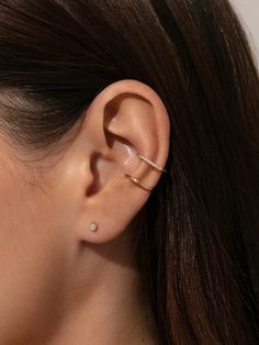 Want some extra gold and shine without another piercing? Our Simple Shine Ear Cuff is just what you need. This double-banded cuff earring has one solid band and one gem studded band for some extra shine. For a full ear stack, pair this gold ear cuff with our Going Solo Huggie Earrings and Medium Girl Boss Earrings. Elegant 14k Gold Tarnish-resistant Ear Cuff, Gold Tarnish-resistant Round Ear Cuff, Minimalist Gold Tarnish-resistant Ear Cuff, Hypoallergenic Gold-plated Minimalist Ear Cuff, Gold Metal Ear Cuff Nickel-free, Holiday Party Jewelry, Uncommon James, Cuff Earring, Double Cuff