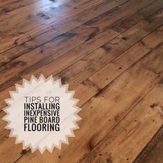 a wooden floor with the words tips for installing expensive pine board flooring on it