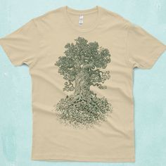 Gnarled Tree Shirt on Army Green or Cream Men's Tshirt S M L XL 2XL 3XL Lines twist and contort to create this incredibly detailed, gnarled tree. Several forest animals wind their way through the contorted roots and branches. Item Description: Hand screen printed with black ink on an army green shirt or dark green ink on a cream Next Level, style 3600 T-shirt. These tshirts are lightweight, comfortable and ultra soft. This and all other images in my shop are my own original creations. See the ph Gnarled Tree, Unique Shirts Design, Tree Tshirt, Tee Tree, Cream Shirt, Nature Shirts, Tree Shirt, Unique Shirt, Tee Shirt Homme