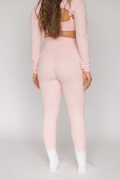 Our leggings are both flattering and supportive. They are high-waisted and feature a wide, double layered waistband that slims and hugs curves in all the right places. Plus, they are designed without a front seam. We recommend sizing up in the Soft Pink Leggings and Bike Shorts. Pastel Leggings Outfits, Pink Gym Wear, Pink Workout Clothes, Pink Vibe, Outfits Pastel, Pink Pilates, 2024 Outfits, Pink Workout, Pink Bottom