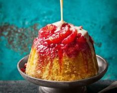 a bundt cake is being drizzled with icing