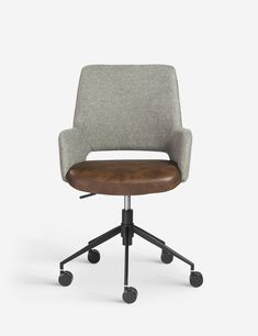 an office chair with wheels and a seat cushion on the back, in grey fabric