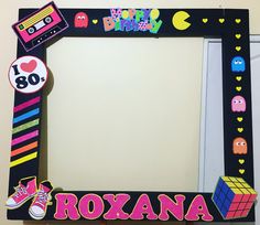 a birthday frame that says roxana in front of it is decorated with stickers and tape