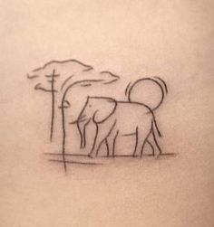 an elephant and its baby are seen in this tattoo