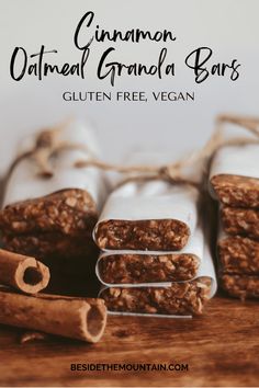 cinnamon oatmeal granola bars are stacked on top of each other with cinnamon sticks