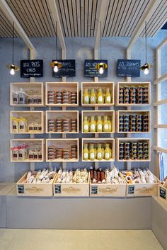 the shelves are filled with different types of condiments