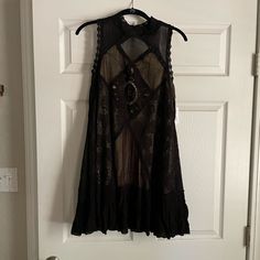 Gorgeous Free People Black Dress. Size Small, New With Tags. Bohemian Sleeveless Mini Dress For Night Out, Sleeveless Gothic Dresses For Date Night, Black Sleeveless Mini Dress For Festival, Black Sleeveless Bohemian Mini Dress, Sheer Black Festival Dress, Black Lace Trim Dress For Festival, Black Fitted Mini Dress For Festival, Black Mini Dress For Festival, Fitted Black Mini Dress For Festival