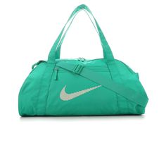 Durable and spacious is the name of the game for Nike's Gym Club Duffel Bag. Crafted with a lightweight and durable construction, this duffel bag features adjustable straps and plenty of storage space so you can always be ready for the day. This product is made with at least 65% recycled polyester fibers, Lightweight and durable ripstop fabric body, Zippered closures, Approx. 13 inch H x 20 inch W x 9 inch D, Removable shoulder strap, Snap pockets on the sides for added convenience, Nike® branding details | Unisex Nike Gym Club Duffel Bag in Stadium Green Green Shoulder Bag With Logo, Green Logo Shoulder Bag, Sporty Everyday Shoulder Bag With Logo, Nylon Bags With Logo For Outdoor Activities, Functional Nylon Bag For Sport, Sporty Rectangular Bag With Logo, Outdoor Nylon Bags With Logo, Functional Shoulder Bag With Logo, Sporty School Bags With Logo