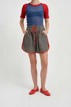 The bailey short is making a summer comeback with a quirky twist on the classic running short. these gingham oversized high-waisted shorts feature a drawstring for adjustable comfort and deep pockets for all your essentials. the curved hemline adds a flattering touch to the style and is piped in bold red linen    - 55% linen 45% cotton    - baggy mid-thigh length short    - elastic waist with adjustable drawstring at the front    - wash in cool water and hang to dry    - made in canada Upcycled Pants, Walking Shorts, Gingham Linen, Running Short, Sweater Jumpsuit, Linen Short, Ruched Dress, High Waisted Shorts, Montreal