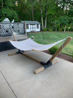 a hammock sitting on top of a cement slab