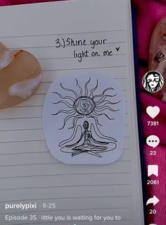 a notepad with an image of a person sitting in a lotus position on it