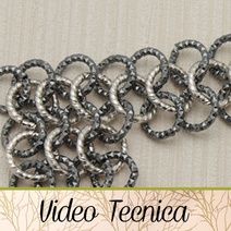 the video is showing how to make an intricate chain bracelet with metal links and beads