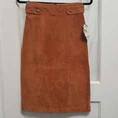 Amazing Vintage With Tags, Terracotta Coral Colored Evan Davies 100% Suede Skirt. Fully Lined, Tab And Button Waist Detail, Kick Pleat. Vintage Size 6; Please See Measurements. Vintage Condition, Please Take Note Of Wear Captured In Photos. All Measurements Approximate; Taken On Flat Garment. Waist: 13" Hip: 17" Length: 25" Vintage Long Lined Skirt, Vintage Lined Skirt For Fall, Vintage Midi Skirt With Pockets, Vintage Fall Skirt With Pockets, Vintage Midi Skirt Bottoms For Fall, Vintage Lined Mini Skirt For Fall, Vintage Long Skirt For Work, Vintage Long Skirt For Fall, Vintage Fitted Midi Skirt