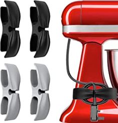 a red blender with four attachments on each side and three different blades attached to it