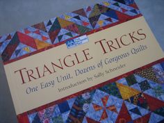 the cover of triangle tricks one easy unit, dozings of gorgeous quilts