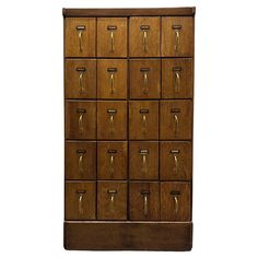 a large wooden cabinet with many drawers