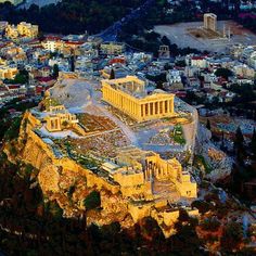 an aerial view of the acrobatic temple on top of a mountain in greece