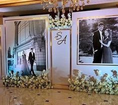 wedding photo backdrop with flowers and chandelier