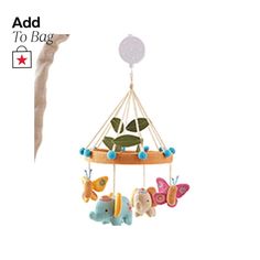 a baby mobile is hanging from a tree branch with butterflies on it and the words add to bag written below