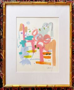 an abstract painting is displayed in a gold frame