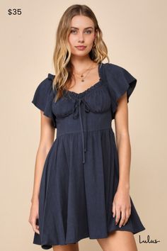 Let your precious side show off in the Lulus Adorable Personality Navy Blue Linen Off-the-Shoulder Mini Dress! This sweet dress has a lightweight, woven linen-blend fabrication that shapes a ruffle-trimmed, elasticized off-the-shoulder neckline that flows into fluttery short sleeves. Fitted bodice features seamed cups and a decorative tying detail at the center. High waist sits atop a skater skirt that finishes at a cute mini hem. Hidden side zipper. Fit: This garment fits true to size. Length: Mid-thigh. Size medium measures 34.5" from shoulder to hem. Bust: Great for any cup size. Waist: Fitted - very fitted at natural waist. Hip: Not Fitted - fuller skirt allows room for hips. Undergarments: May be worn with a strapless bra, adhesive bra, petals, or no bra. Fabric: Fabric has no stretch Knot Tie Dress, Side Show, Navy Blue Linen, Mini Skater Dress, Mini Dress Casual, Sweet Dress, Tie Dress, Dress 100, Fitted Bodice