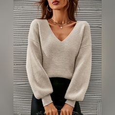 Casual Chic Ribbed Knit Sweater Top * Long Bishop Sleeve, * Ribbed Cuffs * V Neck * Soft Stretch Pullover * Relaxed Loose Fit *Approximate Unstretched Measurements* Xs (2) * Bust * 41.5" * Sleeve Length 18.5" * Length 22.75" Small (4) * Bust * 43.25" * Sleeve Length 18.5" * Length 22.75" Medium (6) * Bust * 44.75" * Sleeve Length 18.5" * Length 23.25" Large (8/10) * Bust * 47" * Sleeve Length 18.75." * Length 24.25" * In Transit * . Will Ship In Approx 7- 14 Days * Color : Beige Khaki Light Tan Monogram Sweater, Sheer Sweater, Drop Shoulder Sweater, Cashmere Sweater Women, Loose Knit Sweaters, Drop Shoulder Sweaters, Bishop Sleeve, Ribbed Knit Sweater, Knitting Women Sweater