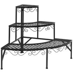 three tiered metal shelf with wrought iron designs