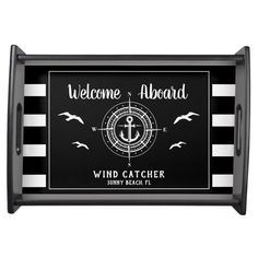 a black and white tray with an anchor on it