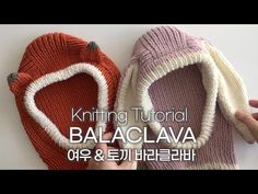 two knitted slippers sitting next to each other