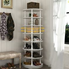 a shoe rack in the corner of a room