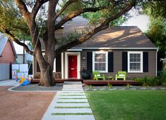 an image of a small house with trees and grass in the front yard on instagram