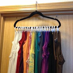 there is a rack with clothes hanging on it and the words, 24 closet solution