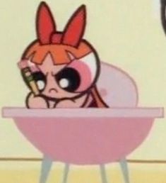 a cartoon character sitting in a chair with a toothbrush