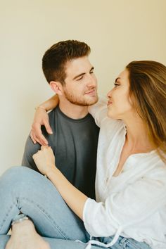 a man and woman sitting next to each other