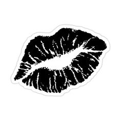 a black and white sticker with the shape of a kiss on it's lips