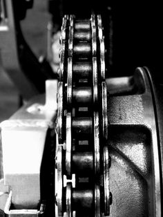 a close up view of the gears on a machine