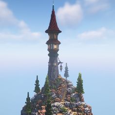 a very tall tower sitting on top of a mountain