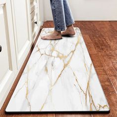 PRICES MAY VARY. Practical Size and Wide Uses: 17"X47", marble cushioned kitchen rugs set is ideal for kitchen, sink, dining room,bathroom and office. Easy to care: The PVC waterproof leather runner rug hardly comes off and can be vacuumed and cleaned regularly as needed. Durable and Comfortable: The anti fatigue comfort standing mat's material is durable and soft to the touch, providing both a comfortable touch and not being too bulky. Fashion Design: This gold white kitchen mat has fashion col Gold White Kitchen, White Marble Kitchen, Laundry Office, Kitchen Rug Runner, Leather Kitchen, Comfortable Kitchen, Kitchen Rugs And Mats, Luxury Marble, Floor Sink