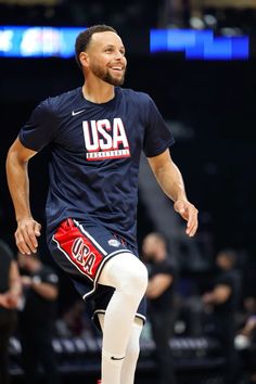 a basketball player dribbling the ball during a practice session for the usa men's national team