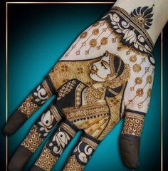 the hand is decorated with intricate designs