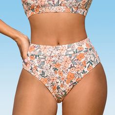 Embrace the beauty of nature with the Women's Peach Blossom High-Waisted Bikini Bottoms. Featuring a vibrant peach and cream floral print, these bikini bottoms are a true celebration of spring and summer. The high-waisted silhouette flatters your figure, providing a comfortable and flattering fit. Crafted from a lightweight and quick-drying fabric, these bottoms are perfect for beach days or poolside lounging. The full coverage design offers modest yet stylish coverage, allowing you to feel conf High Waisted Full Coverage Bathing Suits, High Waist Tankini For Beach Season Sunbathing, High Waist Tankini For Sunbathing Beach Season, High Waist Tankini For Summer Beachwear, High Waist Tankini For Beach Season Swimming, High Waist Summer Tankini For Swimming, High Waist Stretch Tankini For Beach, Spring Brief Bottoms For Beach Party, Stretch High Waist Tankini For The Beach