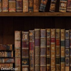 an old bookshelf filled with lots of different types of books on top of each other