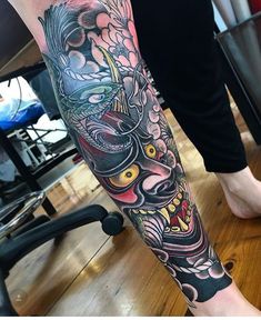 a person with a tattoo on their leg